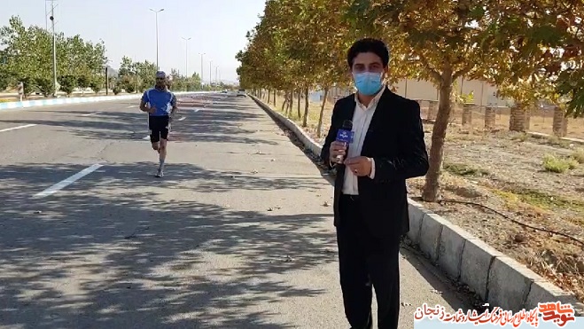 فیلم/ بالا رفتن از پله‌های برج میلاد با دست و پای بسته با یاد شهدا
